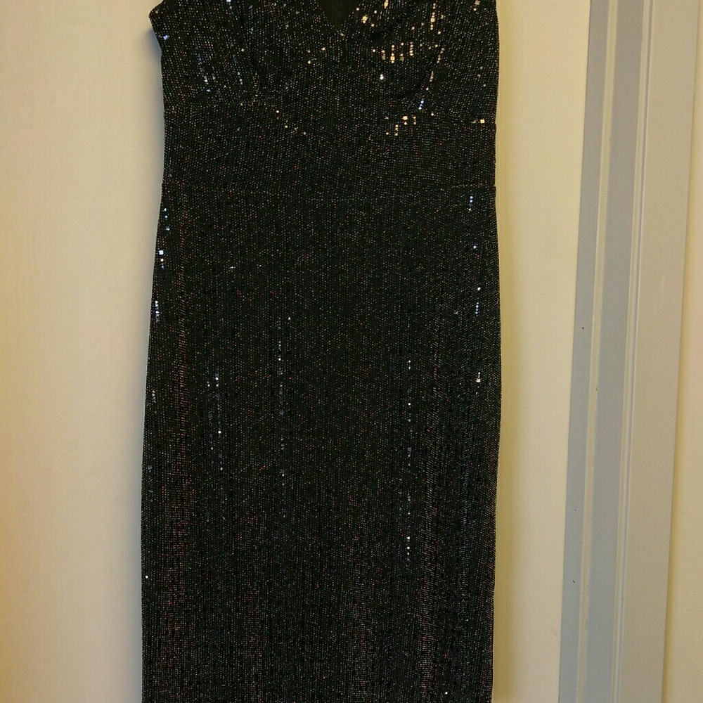 A black sleeveless sequin dress